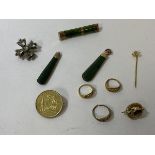 A mixed lot of jewellery including green jade pendants and bar brooch (5cm) with yellow metal mount,
