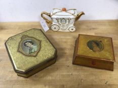 A Queen Elizabeth II coronation novelty musical teapot, (13cm h), two biscuit tins, one inscribed
