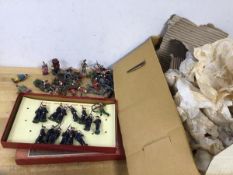 A large collection on tin soldiers including Scots, cowboys and Indians, clowns, field artillery,