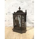 A cast iron umbrella stand with huntsman and dog to front, lacking one finial, (77cm x 47cm x 21cm)