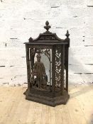 A cast iron umbrella stand with huntsman and dog to front, lacking one finial, (77cm x 47cm x 21cm)