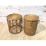 A cylindrical wicker lidded basket and a cane and wicker circular table , (basket 50cm h) (2)
