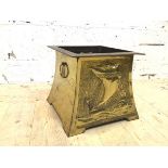 A brass effect log bin with Viking long ship to front and back and drop ring handles to sides, (27cm