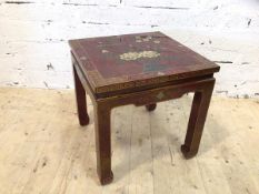 A Chinese side table with foliate and bird decoration to top over channelled frieze (52cm x 51cm x