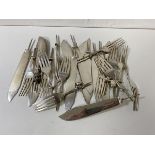 A quantity of 1920's Sheffield silver fish knives and forks, lacking handles, marked M and W,