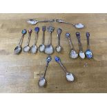 A collection of souvenir spoons, mostly European locations, one marked sterling, one marked 800, (