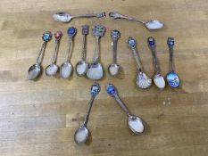 A collection of souvenir spoons, mostly European locations, one marked sterling, one marked 800, (