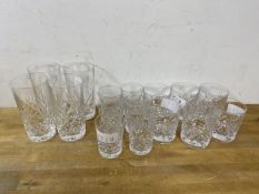 A collection of glasses including six whisky glasses