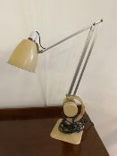 A latter half of 20thc adjustable desk lamp with conical shade on polished metal supports, painted