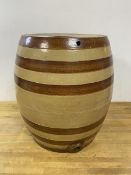 An early 20thc stoneware barrel with circular aperture to top with two aperture's to sides, (44cm