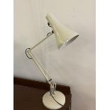 An Anglepoise Lighting Ltd desk lamp with conical shade, on circular base