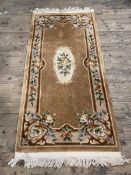 A Chinese runner, central panel with floral decoration with matching border, (184cm x 92cm (
