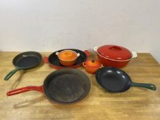 A group of cookware including an AGA griddle