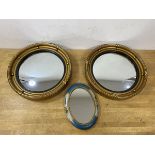 A pair of convex butler's mirrors in composition frames, (32cm), an oval mirror with painted