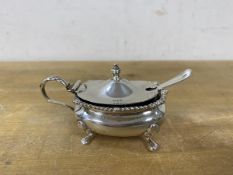 A Hamilton and Inches silver footed condiment pot, with blue glass liner, 1929 Edinburgh