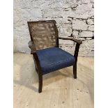 A 1920's mahogany armchair with cane back over sprung seat, (77cm x 59cm x 55cm)
