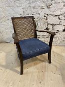 A 1920's mahogany armchair with cane back over sprung seat, (77cm x 59cm x 55cm)