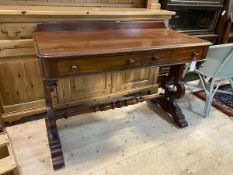 A Victorian mahogany serving table with gallery back over rectangular moulded edge, two frieze