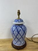 A modern blue and white baluster shaped lidded jar matching previous lot, converted to table lamp,