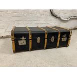 A vintage travelling case with wooden straps, tray to interior, interior in faux reptile skin,