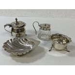 A quantity of silver including three condiment pots, one with glass base and silver collar and