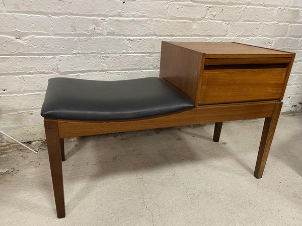 A mid century Chippy teak telephone seat, the superstructure with pull out memory slide for names