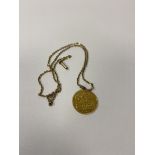 A 1910 gold half sovereign on chain