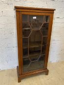 A late 19th early 20thc mahogany bookcase, the rectangular top over glazed door, before three