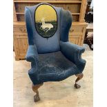 A Georgian style wing back armchair with white heart grospoint panel to back over arms with front