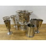 A mixed lot of Epns including two flower tubes with raised pierced edges, two wine glasses, both