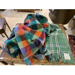 Two vintage wool blankets or throws, one tartan design with label inscribed All Wool, Made in Italy,