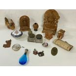 A mixed lot including a carved walnut, two South East Asian carved ornaments including Ganesha,
