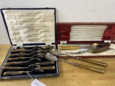 A set of six horn handled knives and forks in original box, fork measures 19cm along with horn