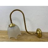 A brass S curve wall light with frosted tulip style shade, label to arm marked Made in Spain, (