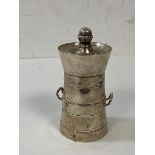 A silver Lighthouse style peppermill, hallmark rubbed, measures 10cm high, weighs 149 grammes