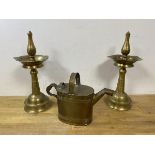 A pair of Indian brass ashtrays, (37cm high), a brass watering can (3)