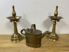 A pair of Indian brass ashtrays, (37cm high), a brass watering can (3)