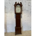 An early 19thc mahogany Grandfather clock with swan neck crest to top with urn finial, over