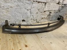 A Regency polished steel convex fender with rope turned bannister on moulded base, measures 13cm