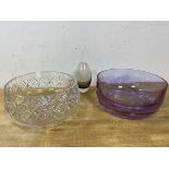 An amethyst glass bowl, measures 9cm x 20cm, a glass bowl and a smoked glass bowl of tulip form (3)