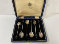 A set of six Mappin & Webb silver coffee bean spoons in original box, 1935