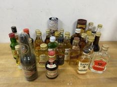 A collection of miniature liquor bottles including Preston Field House, Glenmorange 10 year old,