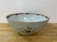 A 19thc Chinese porcelain famille rose pattern punch bowl, repairs and losses, (13cm x 30cm)