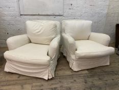 A pair of easy chairs, circa 1930's/40's with later fitted natural cotton cover and feather filled