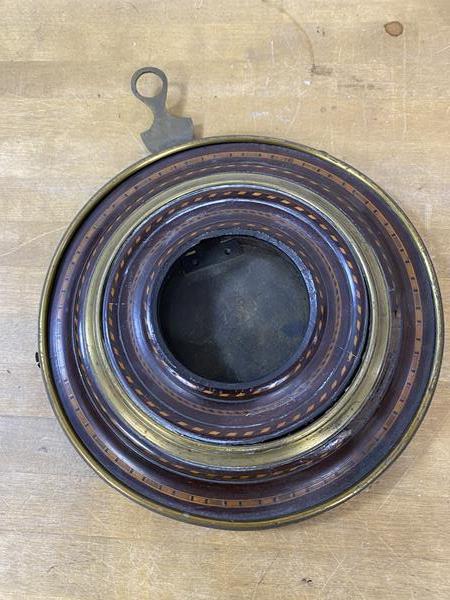 A late 18th early 19thc circular barometer frame with inlaid detail and brass rings, come losses,