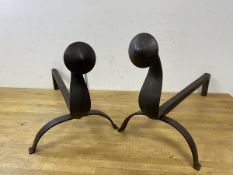 A pair of iron Arts and Crafts style andirons, (54cm x 30cm)