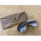 A vintage pair of Ray-Ban sunglasses, the bridge inscribed B and L 1 10 12 K G F, measure 13cm