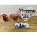 A mixed lot including a cranberry glass water jug