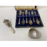 A set of five silver coffee spoons, (11cm), and another smaller spoon, a