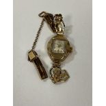 A 1930's / 40's ladies rotary wrist watch, case marked .375 on rolled gold strap, a/f